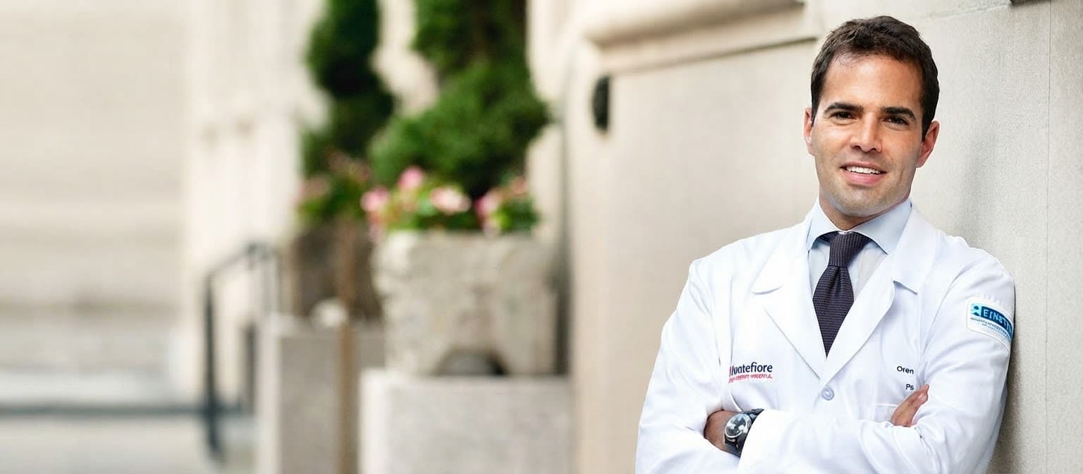 Dr. Oren Tepper, board-certified plastic surgeon, outside his New York practice
